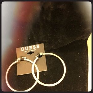 Guess gold earrings